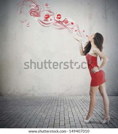 Young fashion girl with red kiss