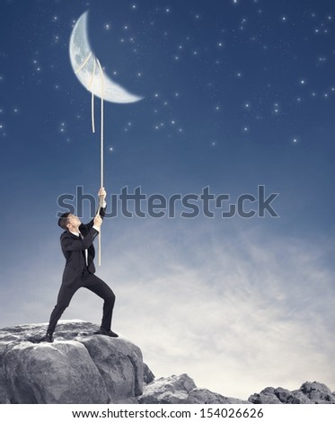 Concept Of A Businessman That Wants The Moon