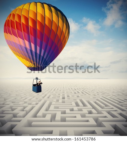 Concept Of Overcome Obstacles With Businessman On A Hot Air Balloon