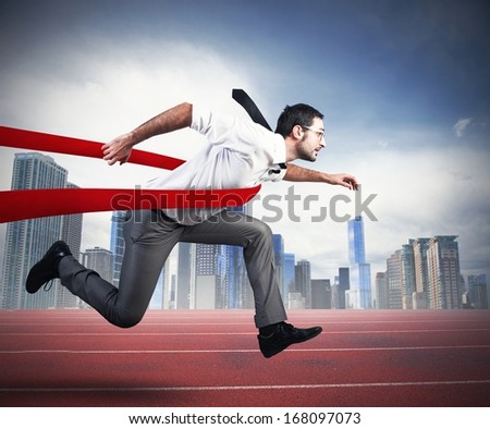 Concept of successful businessman in a finishing line