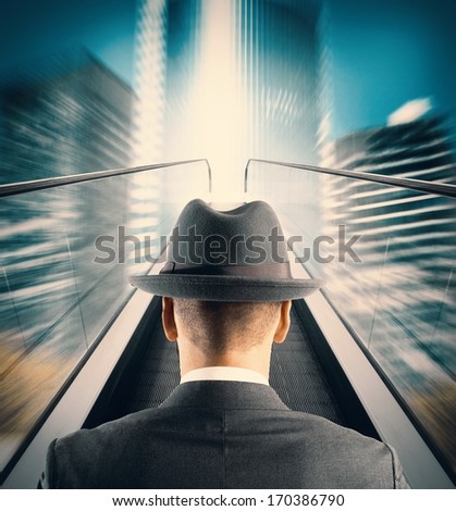 Concept of Easy way to success with businessman and escalator