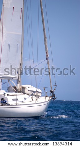 Sailboat on the deep ocean