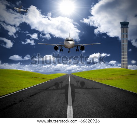 Airplane in the airport in the green field