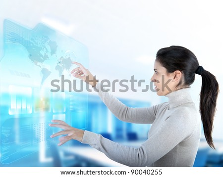 Businesswoman working on modern touchscreen diplay