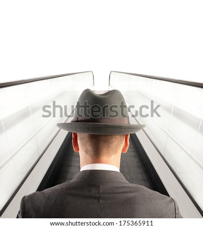 Concept of Easy way to success with businessman and escalator