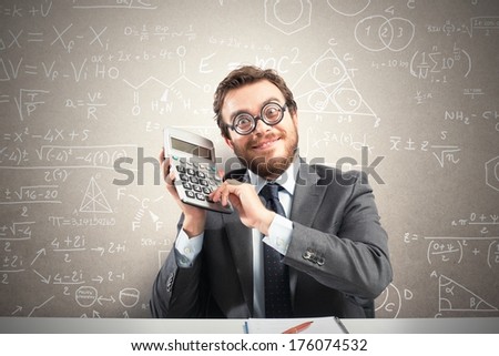 Concept of success with happy nerd businessman with calculator.