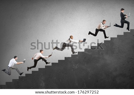 Concept of challenge of technology with running businessman with laptop