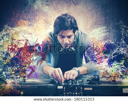 DJ at work playing music with a mixer