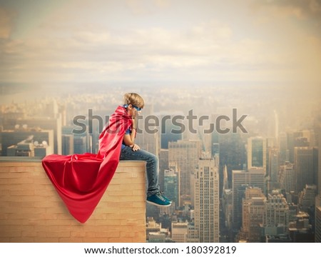 Concept of fantasy of a super hero child
