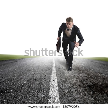 Business in action with running businessman in a road