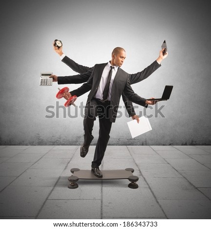 Multitasking concept with businessman at work doing gymnastics