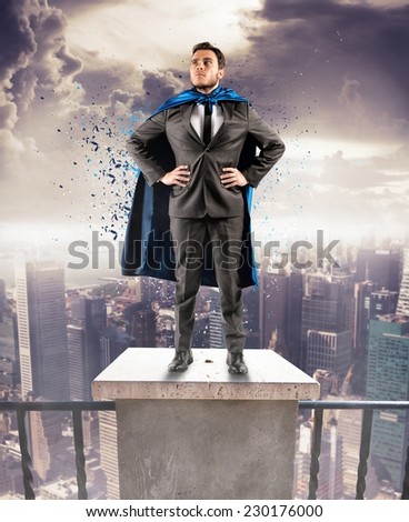 A brave businessman hero above the skyscrapers