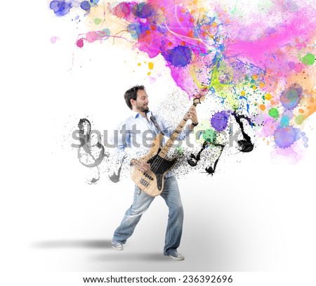 Boy play with bass guitar with colorful effect