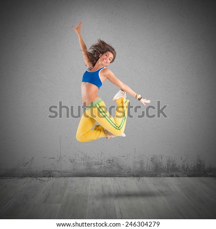 A dancer jumps in choreography