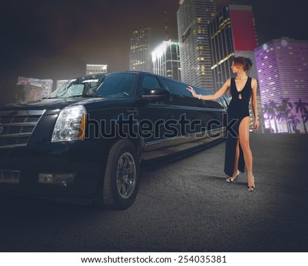 Rich woman touches and admires her limousine