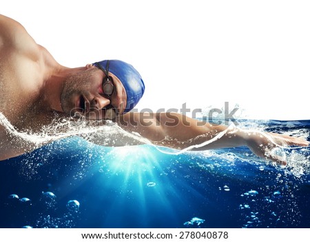 Swimmer swims in the sea in sunshine