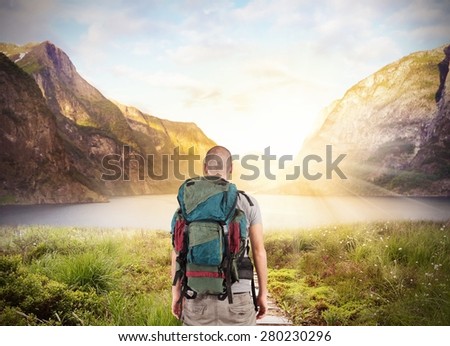 Explorer find a lake in beautiful landscape