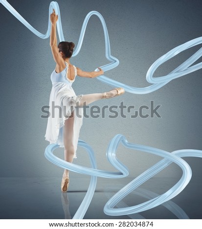 Elegant woman classical dancer dancing on tiptoe