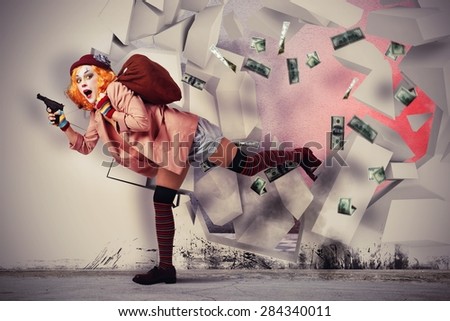 Woman clown thief breaks the bank vault