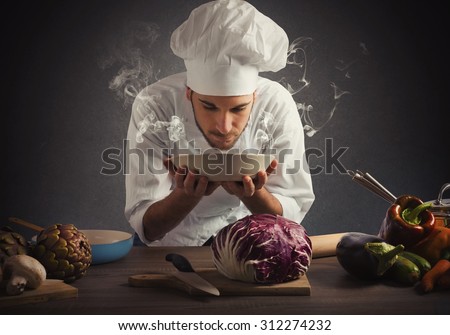 Chef smelling the aroma of a dish