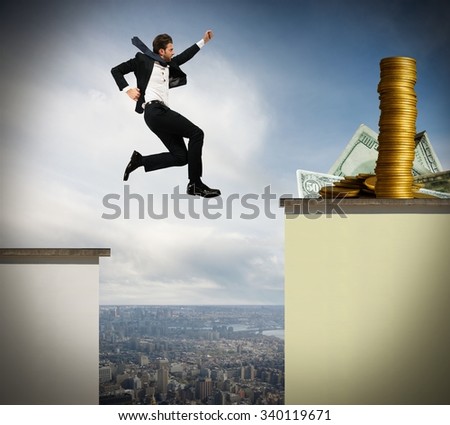 Determined businessman jumps risky to get money