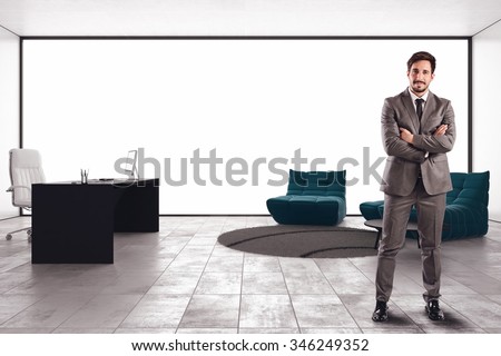 Successful businessman in his luxury executive office