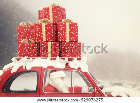 Santa Claus drives a red car full of Christmas present