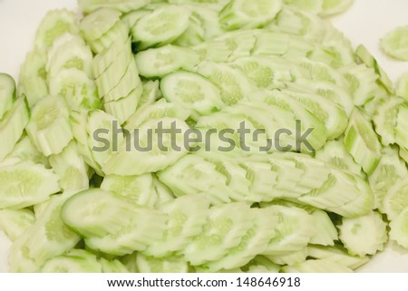 A lot of cucumber slices , Sliced cucumber.