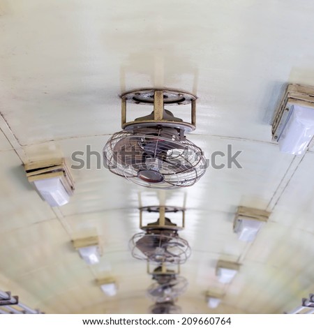 tropical wooden colonial style ceiling fan