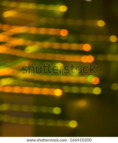 Abstract holiday lights in warm tones. Bokeh background