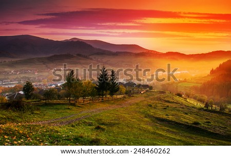 Sunrise in the mountain town of autumn morning in mountains Carpathians.