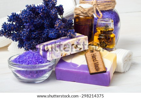 Spa concept. Lavender handmade soap and accessories for body care (lavender, soap, towel, sponge, sea salt)
