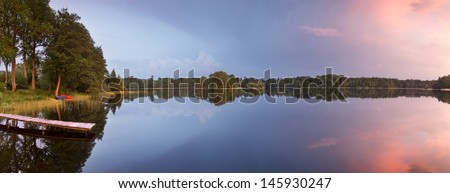 Tranquil water on the lake in North Poland / Lake Bobi?cino / Panoramic photography