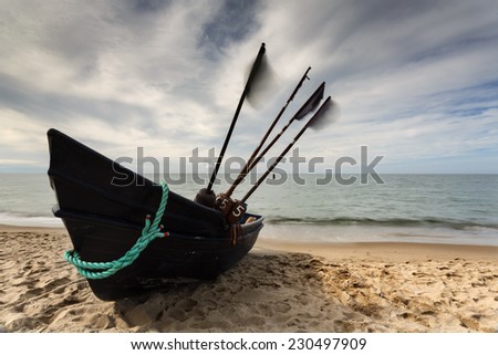 Fishing boat on sandy beach in north Poland.Baltic Sea/Fishing boat Baltic Sea
