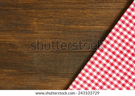 Checkered Tablecloth On The Wooden Background/ Checkered Tablecloth On The Wooden Background