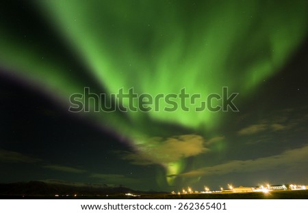 Northern Lights Aurora Borealis in Iceland.Reykjavik City/ Night Lights