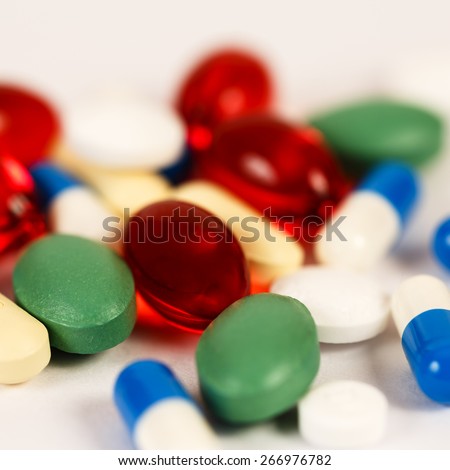 Colorful drugs and pills background in square format/ Drugs and Pills