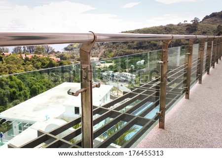 stainless steel railing pole and holder at the balcony get rusty
