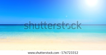 White beach, clear sea and blue sky