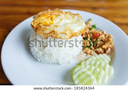 Thai spicy food basil chicken fried rice recipe with fried egg (Krapao Gai), Thai food