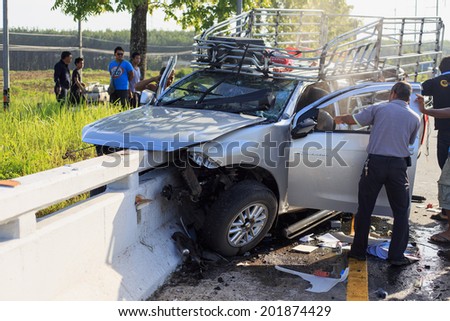PHANG NGA, THAILAND - JUNE 27 : Car accident on the road and crashed into a concrete bridge which causing the driver serious injury. june 27, 2014 in phang nag thailand.