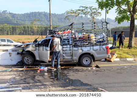 PHANG NGA, THAILAND - JUNE 27 : Car accident on the road and crashed into a concrete bridge which causing the driver serious injury. june 27, 2014 in phang nag thailand.