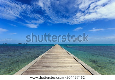 Wood bridge to the sea in Koh Samui, Thailand