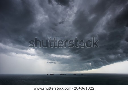 dark clouds before raining over the sea in Thailand