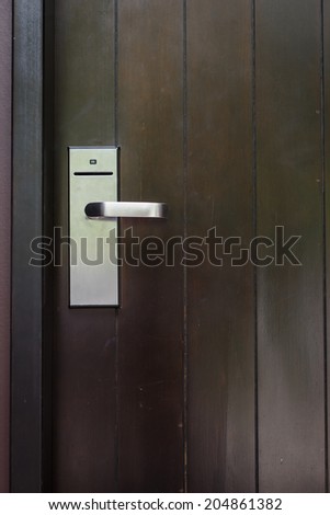 Entrance door with electronic keycard lock system