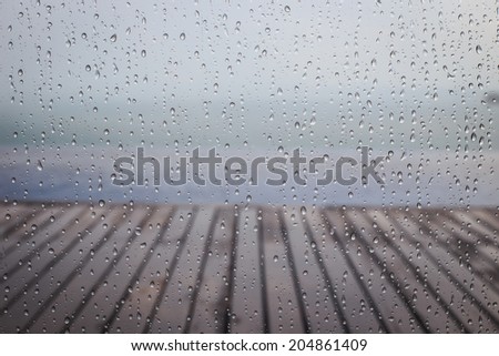 Drops of rain on windows glass surface