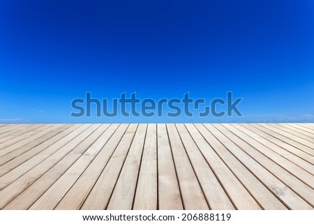 Wood decking and blue sky