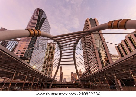 BANGKOK - AUG 11: Sky walk architecture like a spider for passengers to transit between Sky Transit and Bus Rapid Transit Systems at Sathorn-Narathiwas junction on AUG 11, 2014 in Bangkok, Thailand.