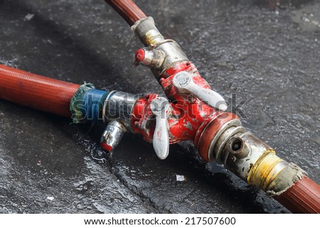 Fire Water hose connector on the ground