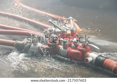 Fire Water hose connector on the ground